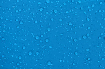 Naklejka na ściany i meble Rainproof tent sheet with rain drops.macro shot