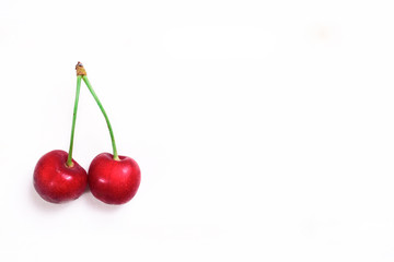 Fresh cherries on wooden table