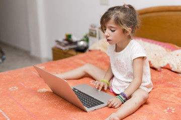 Girl sitting with a laptop