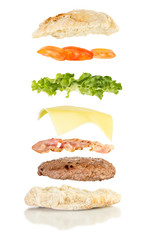 floating sandwich, burger sandwich with hamburger, bacon, cheese, tomato, lettuce and mushrooms