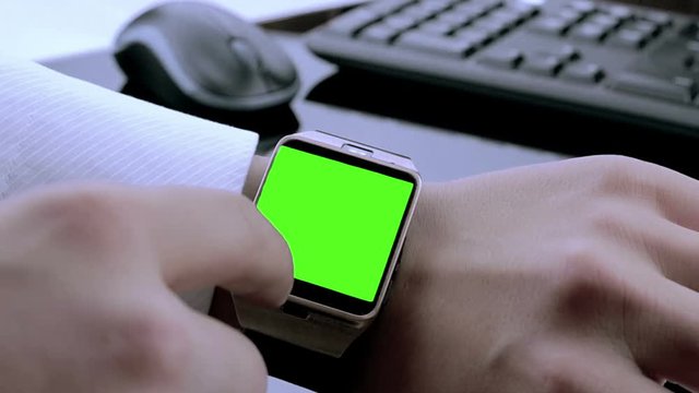 Business Man Using Smartwatch With Chroma Key Green Screen, New Technology Concept