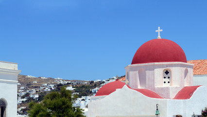 A white church with red roof on Mykonos
