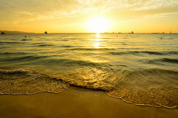 Fototapeta na wymiar The waves on the shore of the main beach in Boracay , 