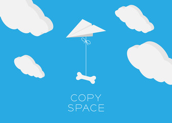 Paper plane hanging bone flying in the blue sky and cloud background with copy space, postcard size 5x7 inches