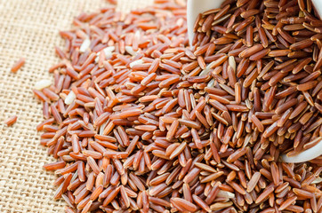 red rice in a white bowl.