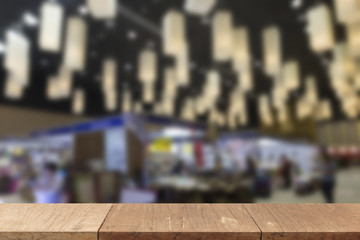 blur background of people shopping in fair
