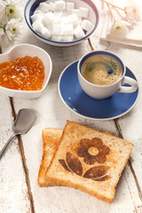 Breakfast, coffee and toast with a flower pattern 