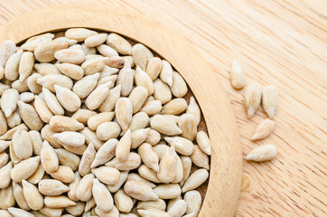 Sunflower seeds on dish.