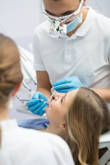 Fototapeta premium Girl in dentistry