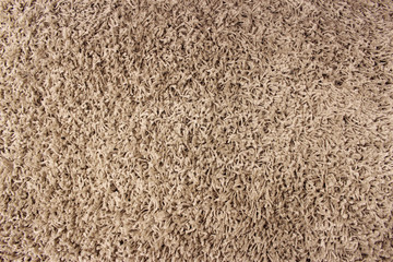Fragment of material background brown carpet
