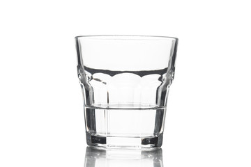 Glass with water on a white background