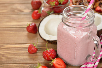 Refreshing cocktail with coconut milk and strawberries