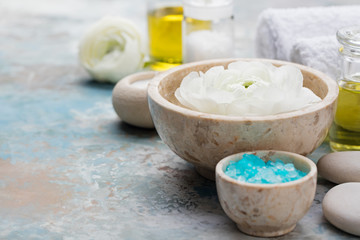 Spa and wellness massage setting, white flowers