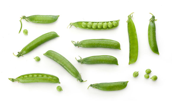 Fresh green pea pods and peas