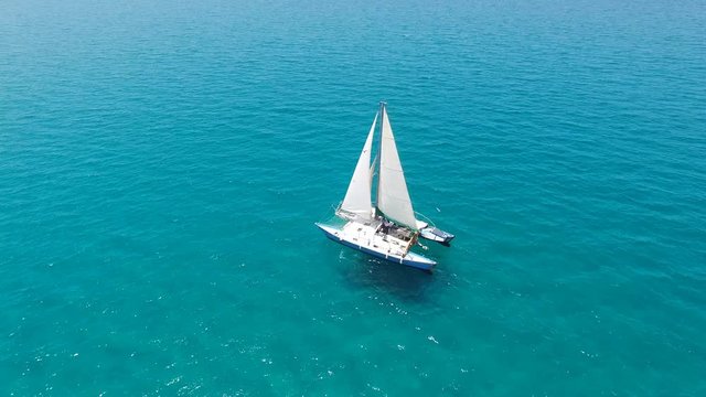 Catamaran sailing at open sea - Aerial footage