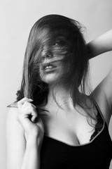Obraz premium Model test. Portrait of beautiful woman playing with her hair