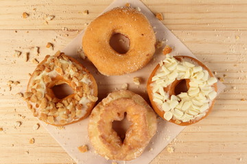 Donuts on wooden background