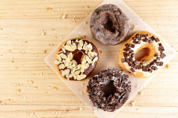 Donuts on wooden background