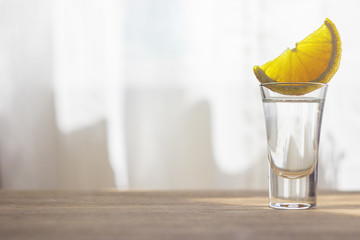 Tequila shot with orange