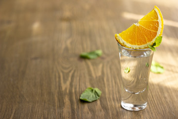 Tequila shot with orange