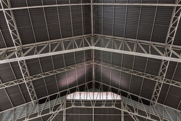 Abstract.metal framework of the roof of industrial premises in t