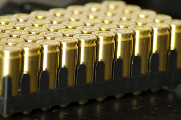 9mm bullet for a gun isolated on dark background.