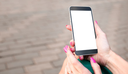 Mock up smartphone with blank screen in woman hands