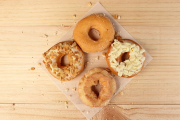 Donuts on wooden background