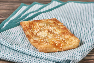 Pie with caraway on napkin
