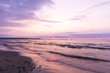 Birds sitting on the breakwater, Baltic Sea