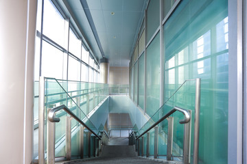 Building interior stairway with glass windows