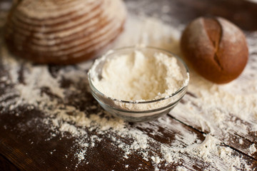 Fototapeta na wymiar Bread and flour on the table