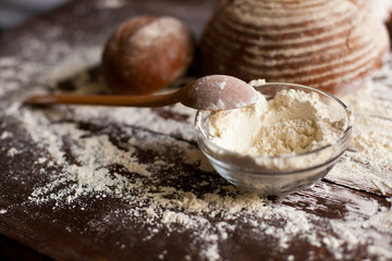 Fototapeta premium Bread and flour on the table