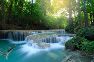 Fototapeta na wymiar Erawan Waterfall, beautiful waterfall in deep forest, Erawan National Park in Kanchanaburi, Thailand