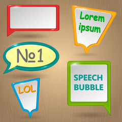 Colorful text speech bubbles as eps10 vector icon emblem of talking or having conversation, communication illustration clip-art