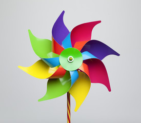 Colorful pinwheel isolated on grey background