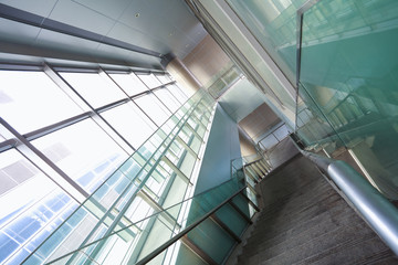 Building interior stairway with glass windows