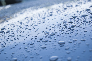 Dews on blue texture diagonal view