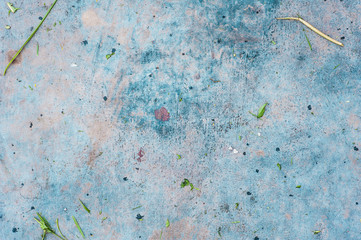 dirty surface colored gray-blue with raindrops