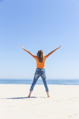 Obraz premium Frau am Strand