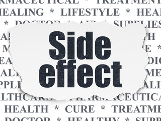 Medicine concept: Side Effect on Torn Paper background