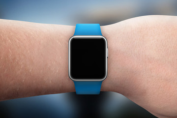Smart watch on hand with isolated, blank screen for mockup.