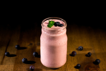 Close up of fruit yougurt smoothie - health living concept.