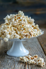 Popcorn on a stand cake.