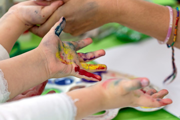 Background with kids painted hands