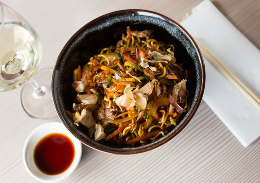 japanise style noodles with veal and vegetables yakisoba beautifully served in the bowl