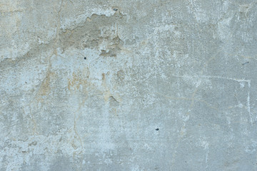 Wall fragment with scratches and cracks