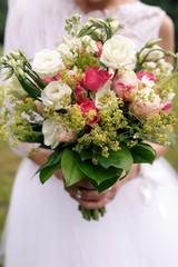 Wedding boho bouquet from white eustomy and pink roses
