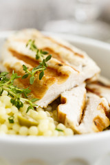 Lemon chicken with thyme and couscous