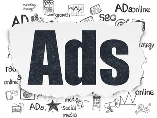 Advertising concept: Ads on Torn Paper background